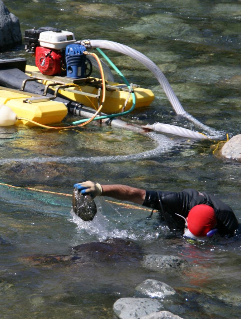Tom Ashworth gold dredging on Klamath River